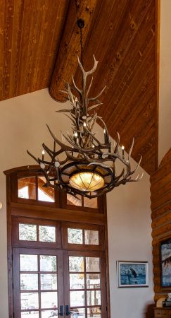 Antler Chandelier with Mica installed in log home Entry, Colorado Mt Bross XL 