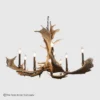 round fallow deer antler chandelier with tall copper candles