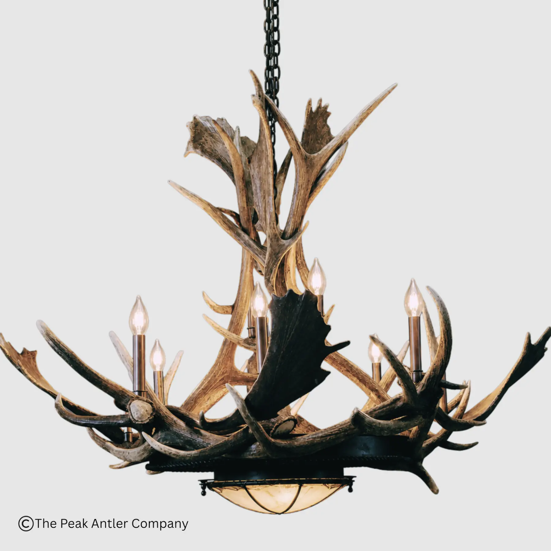 round fallow deer antler chandelier with a rawhide and mica iron base