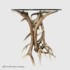 elk and mule deer antler end table with a round glass top