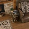 elk and mule deer antler end table in a home living room