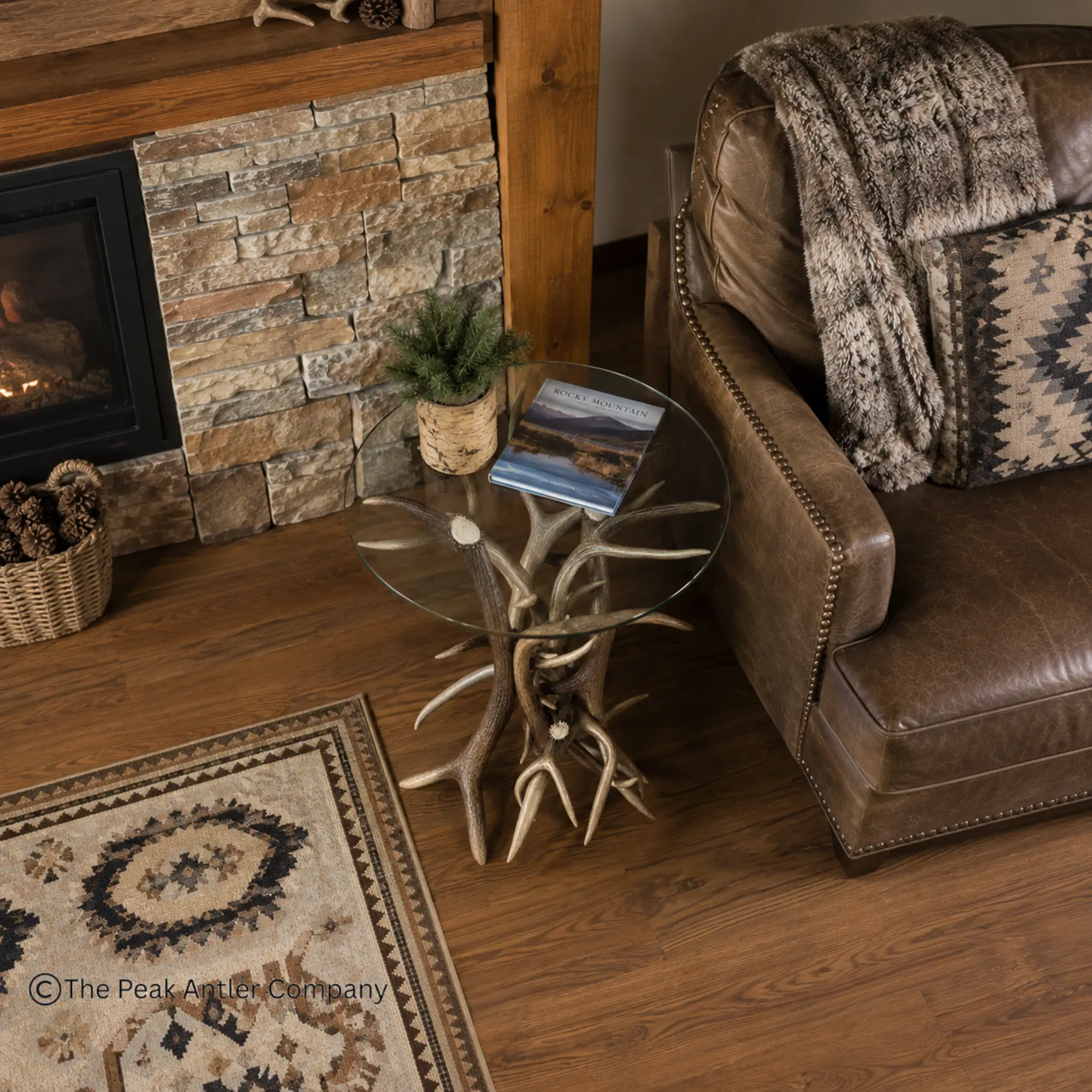 elk and mule deer antler end table in a home living room