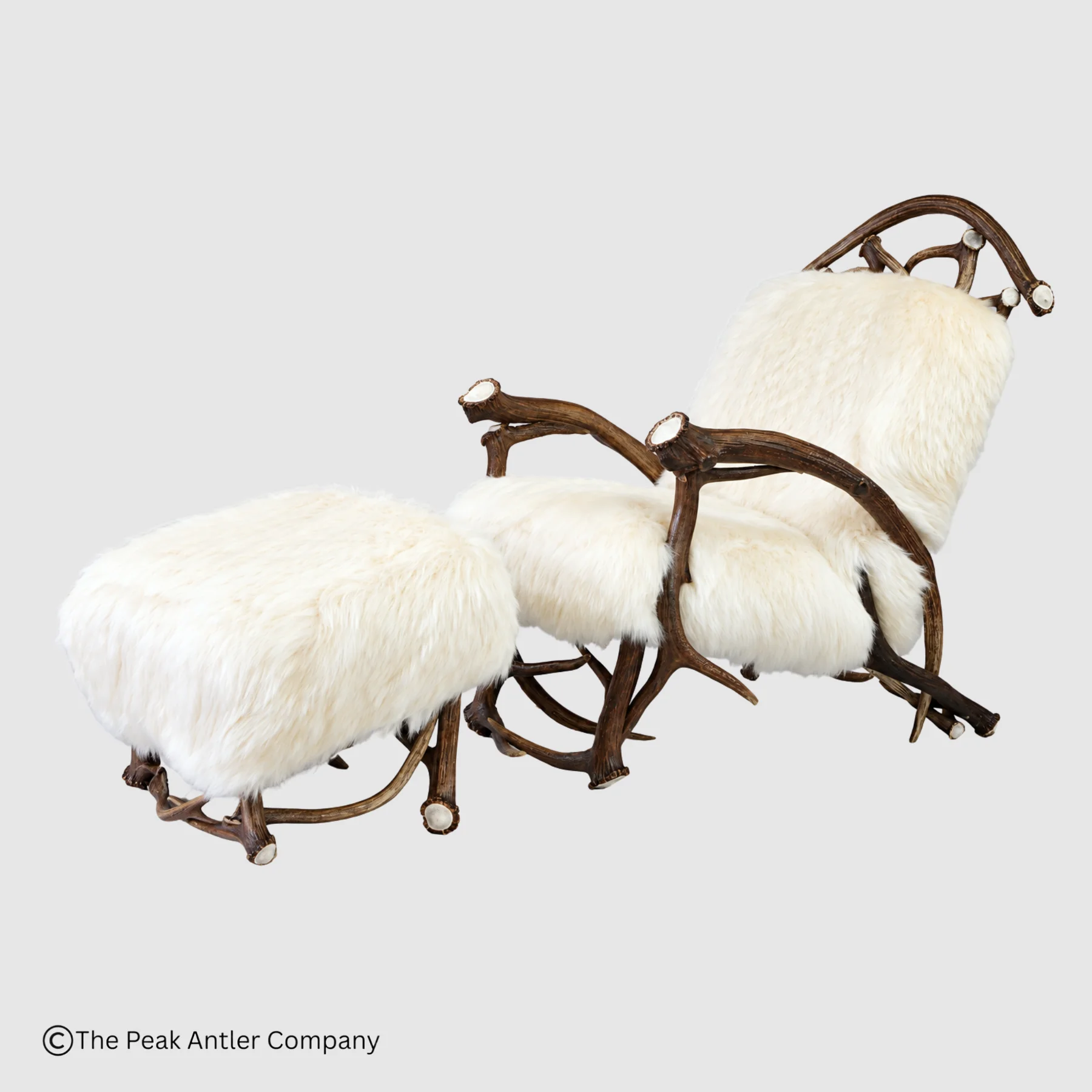 elk antler lounge chair and ottoman with soft Australian sheep wool
