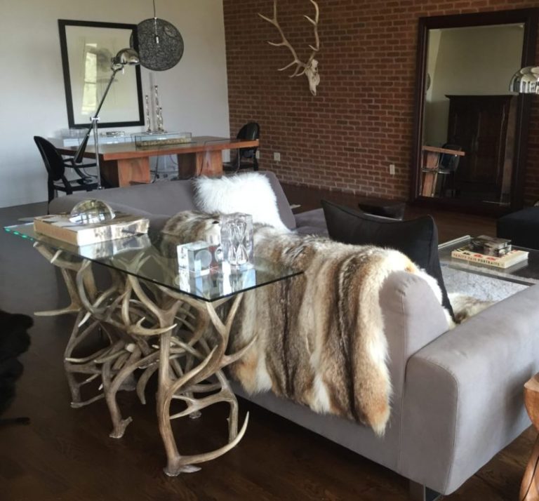 Elk and Mule Deer Antler Sofa  Table in a Modern Living Room