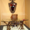 roosevellt antler desk and chair with antler mirror with deadhead crest at a western trade show