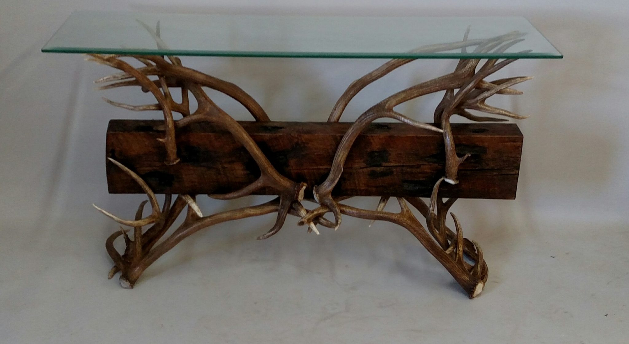 timberline elk and timber sofa table with glass top