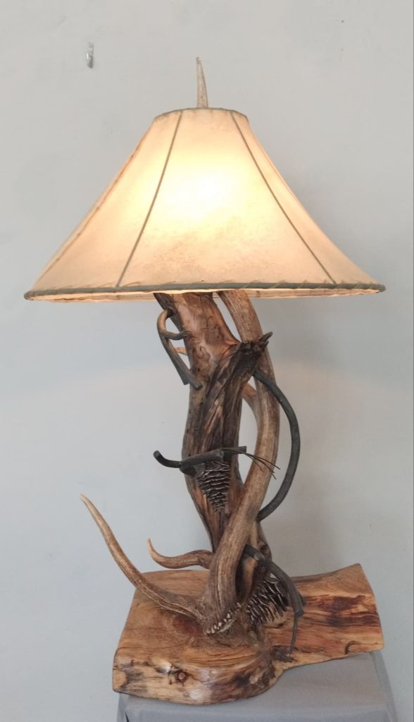 elk and aspen wood lamp with metal hand forged pincones