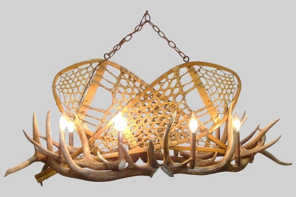 oval mt evans chandelier with elk antlers and replica vintage snowshoes