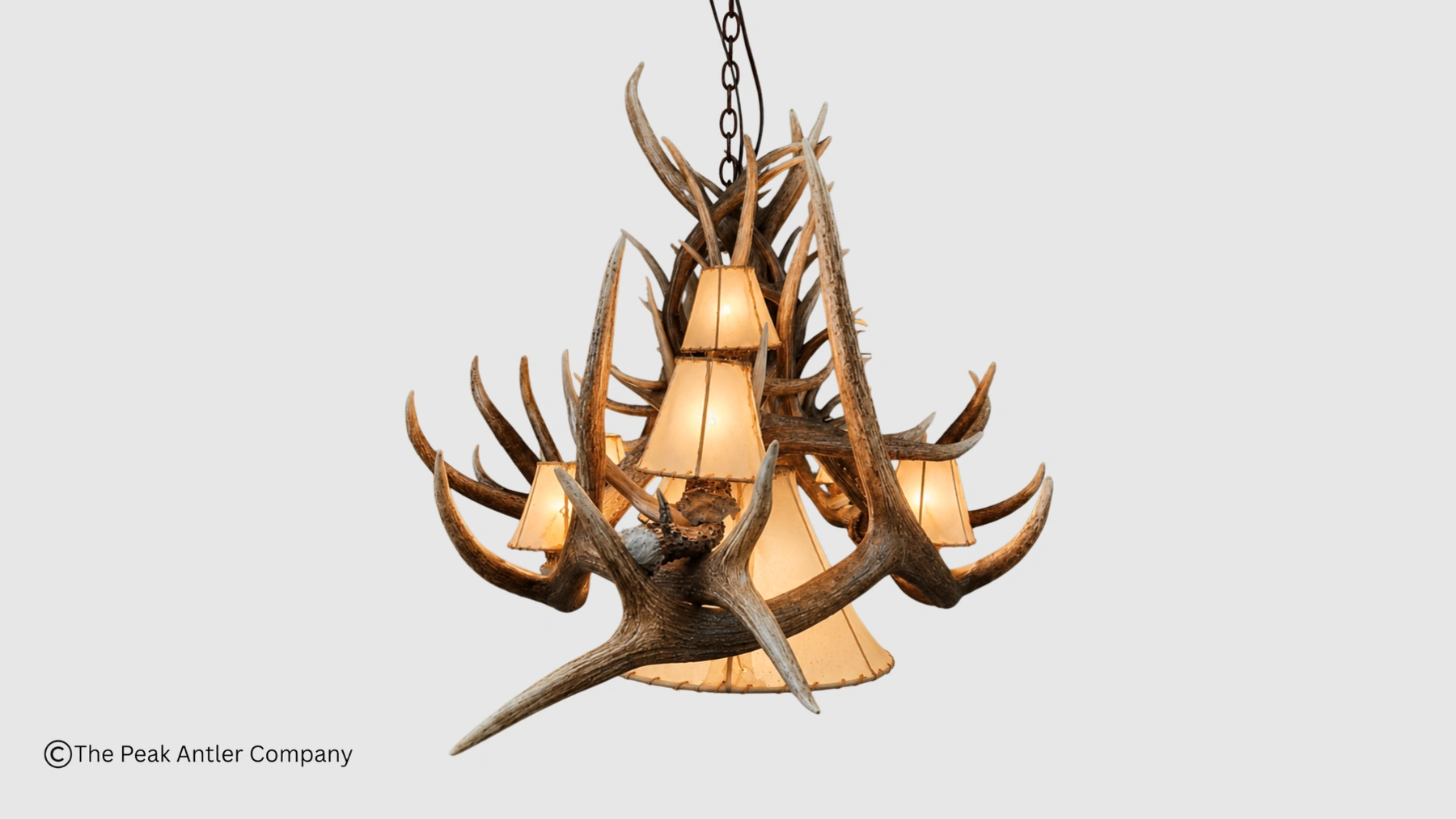 side view of the oval elk and mule deer antler chandelier with rawhide lampshades