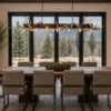 modern whitatil antler chandelier with metal beam in a home dinning room over the table