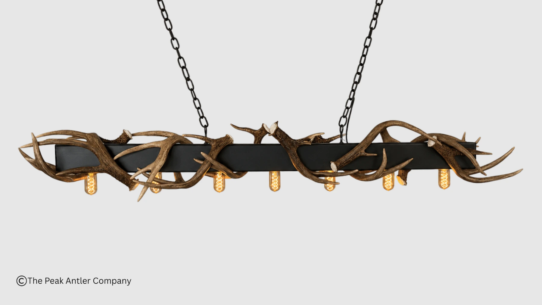 whitetail deer antler chandelier with a modern metal beam