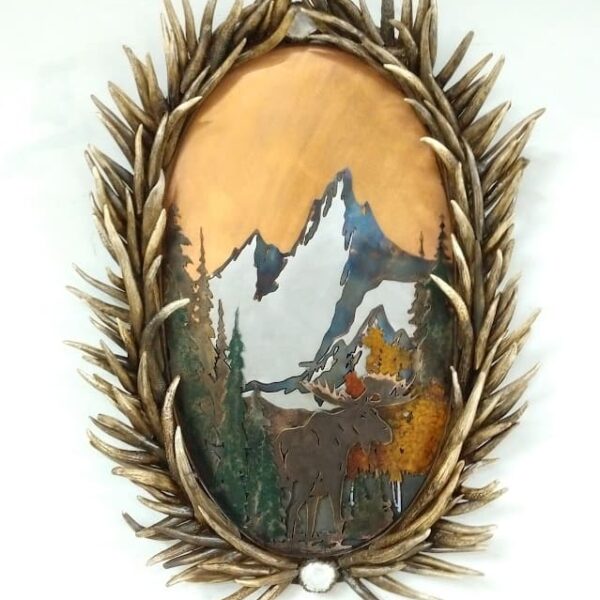 mule deer antler frame with a metal moose and mountain scene