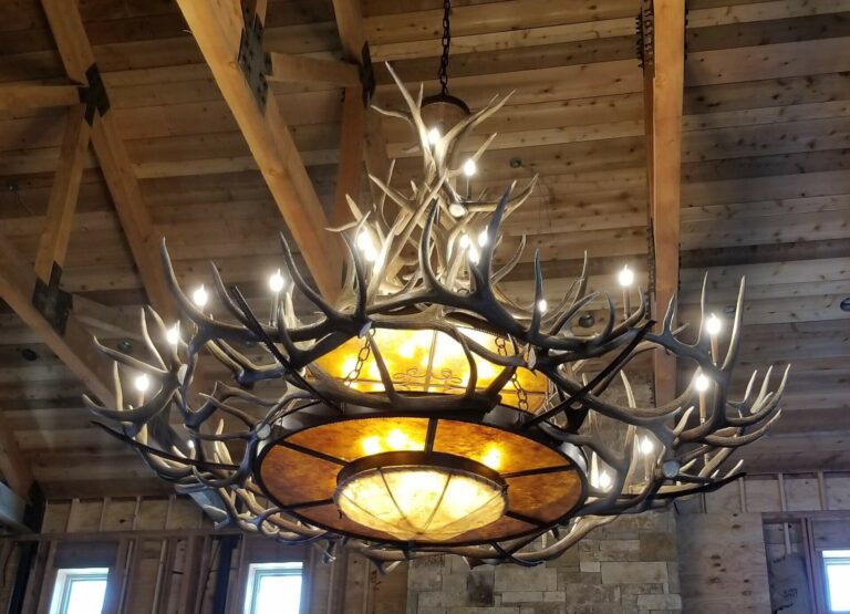 Custom XXL Mt Bross elk antler chandelier hanging in San Antonio home
