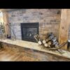 in home picture of the elk and mule deer antler half round log rack