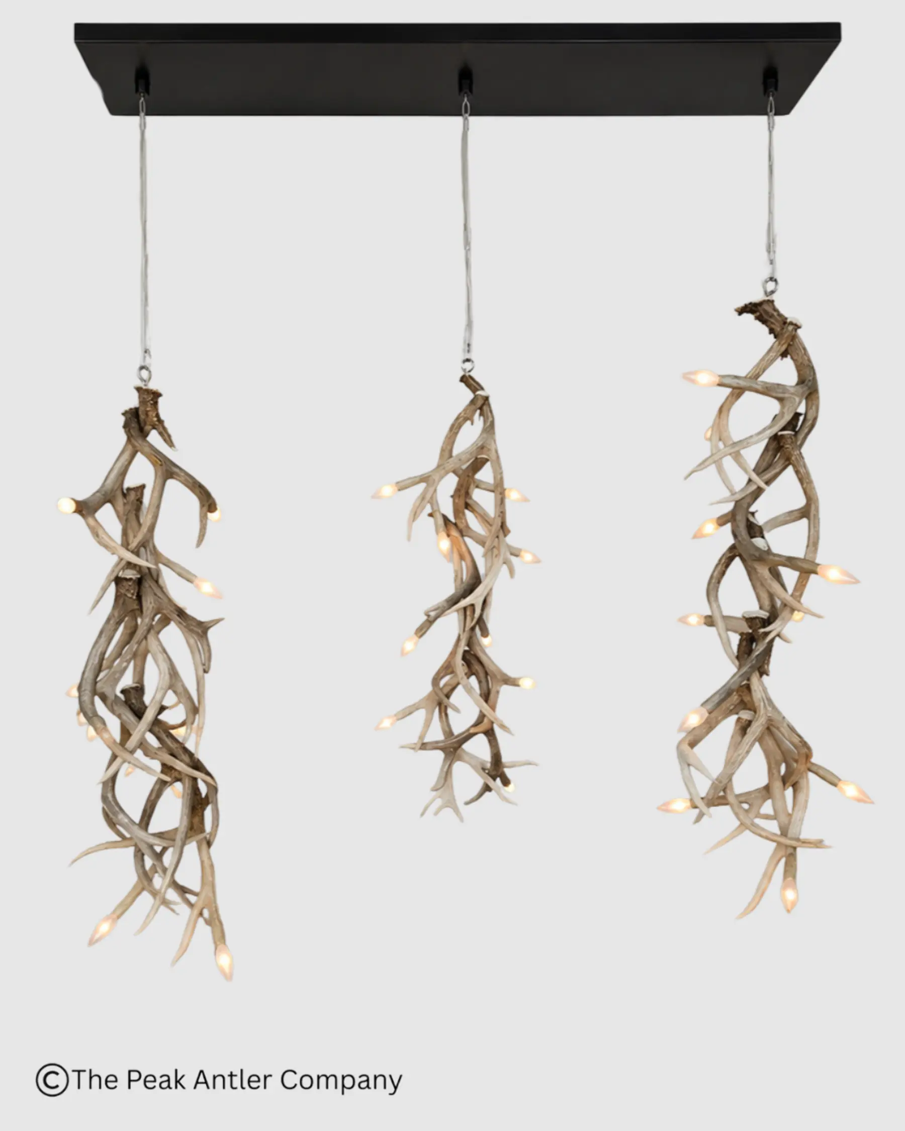 set of three tall narrow mule deer antler chandeliers