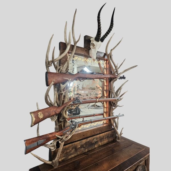 rifle rack with axis deer antler and blesbok skull
