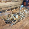 elk antler coffee table with hand carved Indonesian ram skull