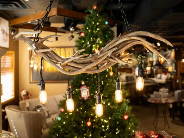 A Seven Falls Chandelier hanging in the Tweeds showroom in Woodland Park, CO