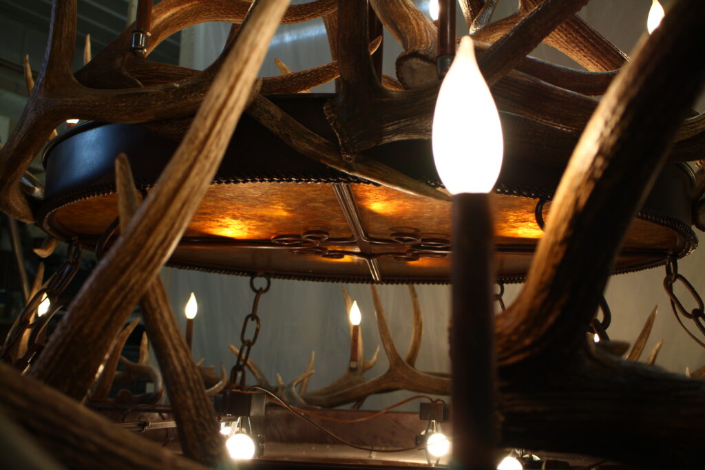 Elk antlers illuminated with mica and iron base